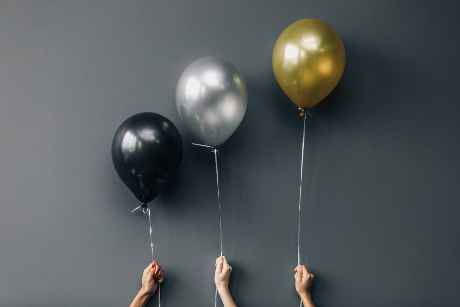 black silver and gold balloons