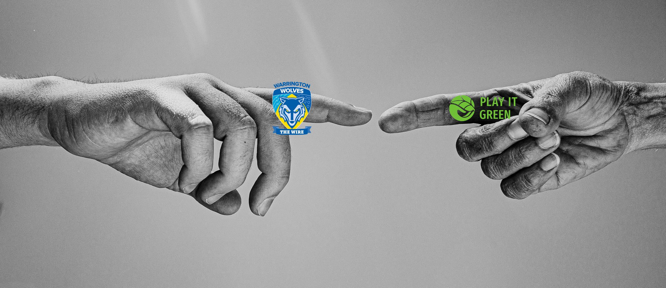 two reaching hands in black and white