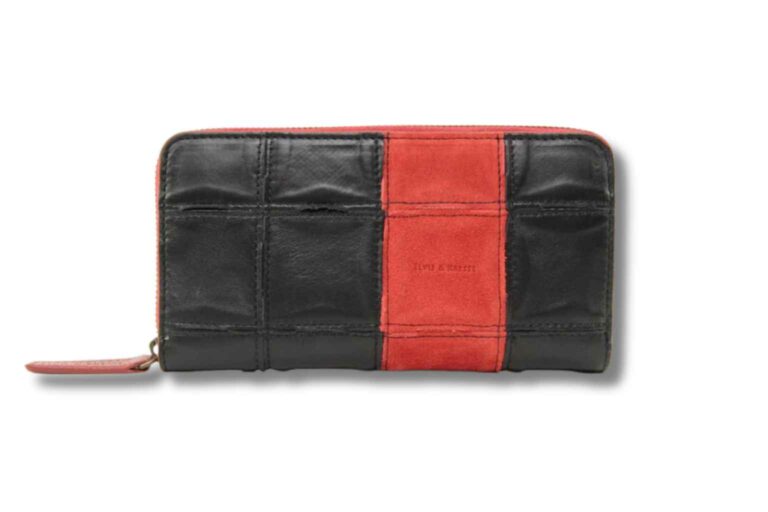 Sustainable Wallets The Fire Hide purse combines hand woven rescued leather and decommissioned fire hose and is lined with reclaimed parachute silk